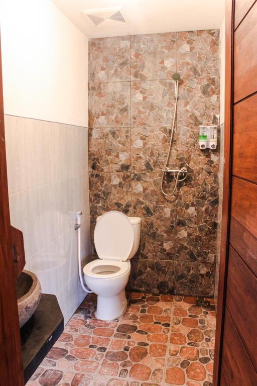 Koupelna v ubytování Griya Gribig Guest House Mitra RedDoorz