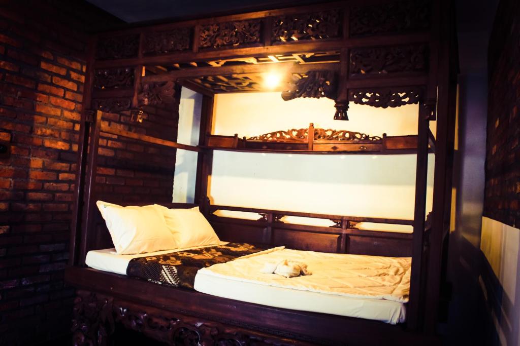 Fotografie z fotogalerie ubytování Griya Gribig Guest House Mitra RedDoorz v destinaci Malang