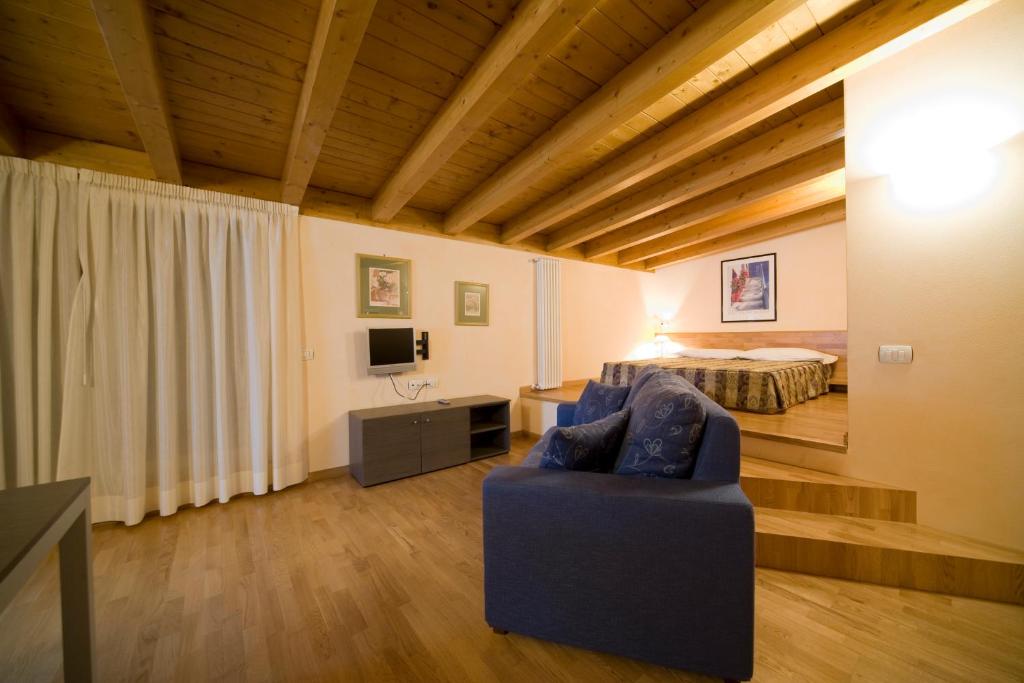 TV a/nebo společenská místnost v ubytování Hotel Concordia