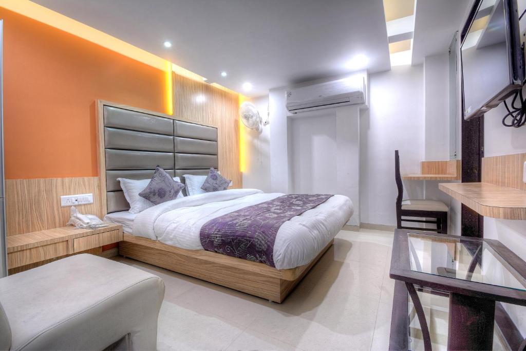 Postel nebo postele na pokoji v ubytování Hotel One Up
