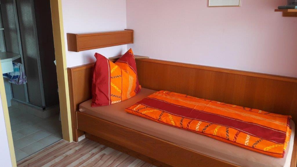 Postel nebo postele na pokoji v ubytování Arkadenhaus Steiner