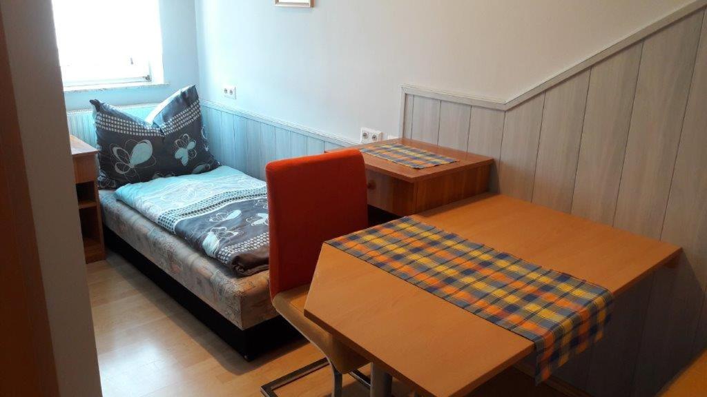 Postel nebo postele na pokoji v ubytování Arkadenhaus Steiner