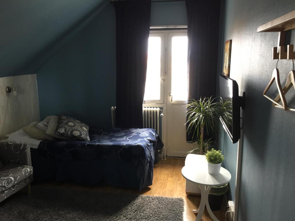 Posezení v ubytování Höjdens Lågprishotell
