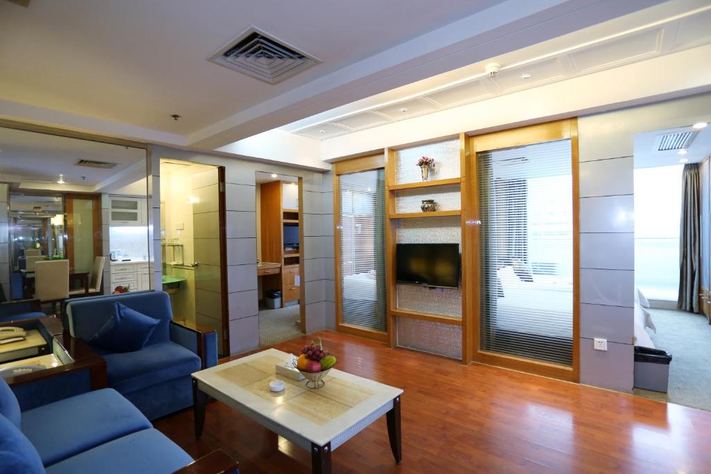 TV a/nebo společenská místnost v ubytování Yihe Hotel Ouzhuang
