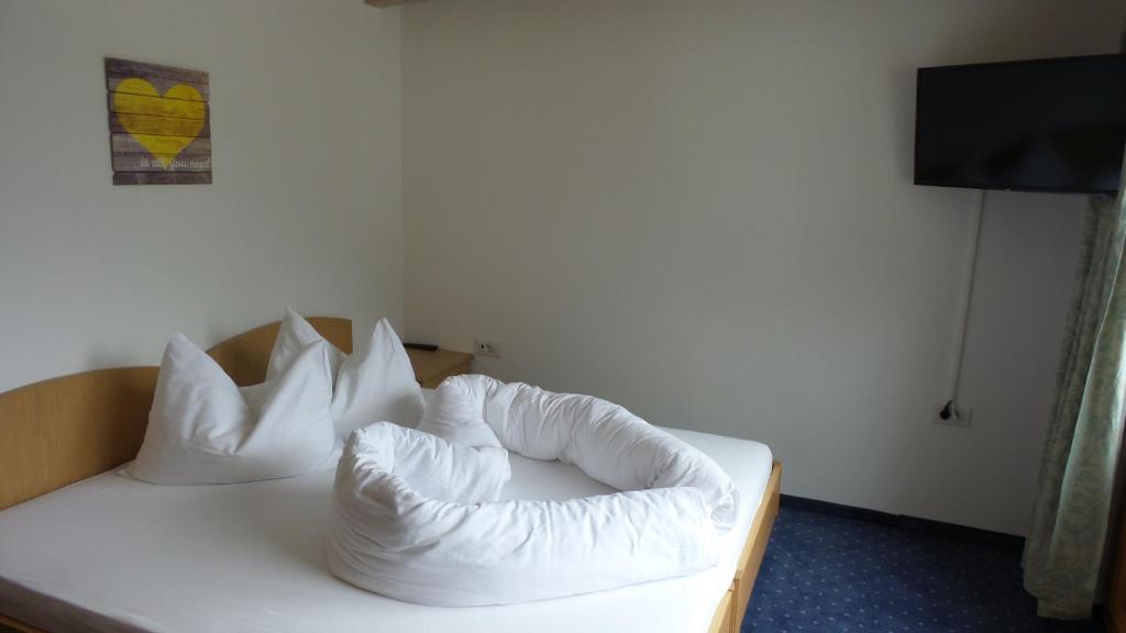 Postel nebo postele na pokoji v ubytování Bad Kochenmoos