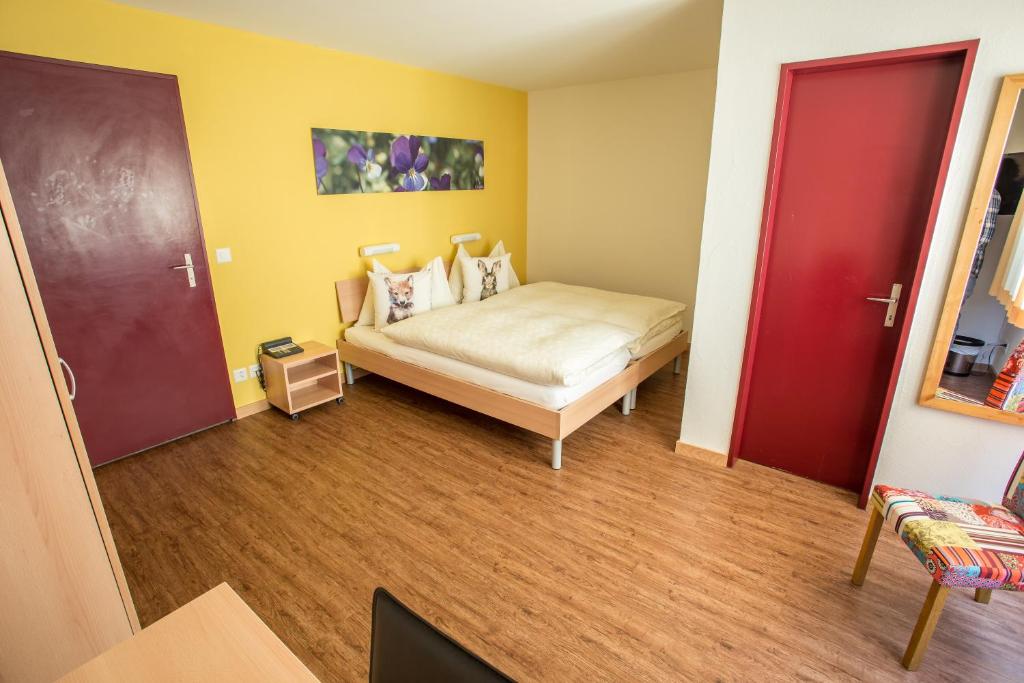 Postel nebo postele na pokoji v ubytování Kessler's Kulm Gästehaus
