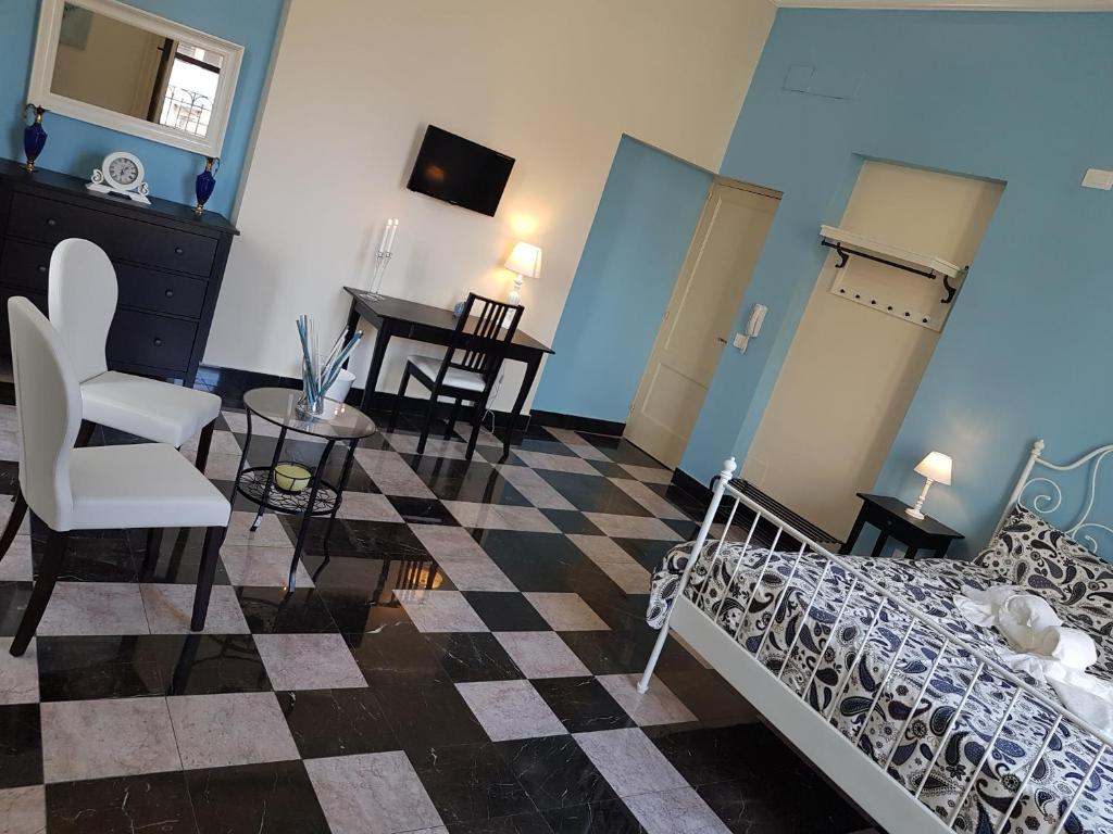 TV a/nebo společenská místnost v ubytování Central Suites Catania