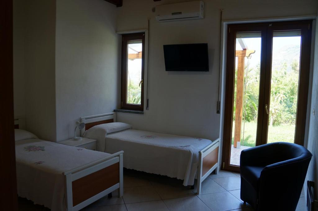 Postel nebo postele na pokoji v ubytování Hotel Maremonti