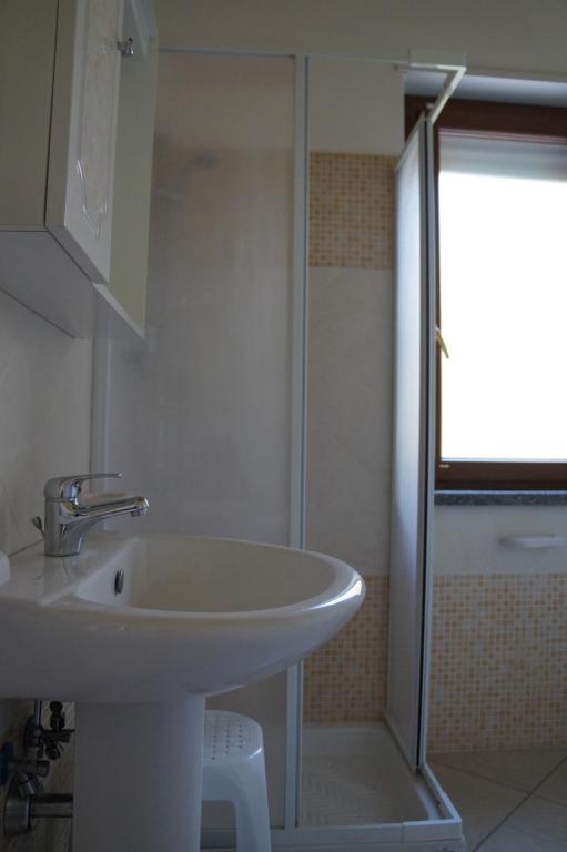 Koupelna v ubytování Hotel Maremonti