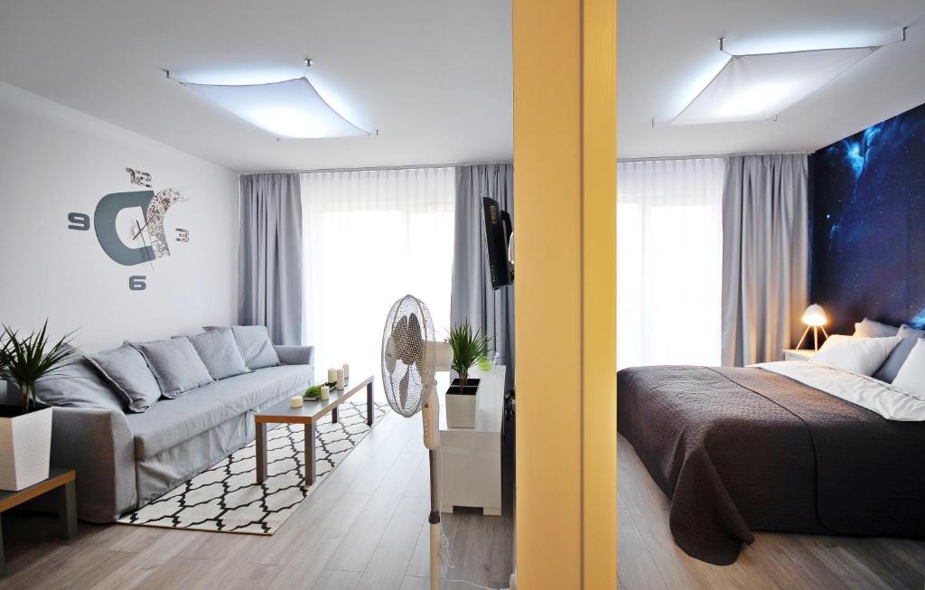 Posteľ alebo postele v izbe v ubytovaní Apartamenty REZULAK Solna B104 204 303