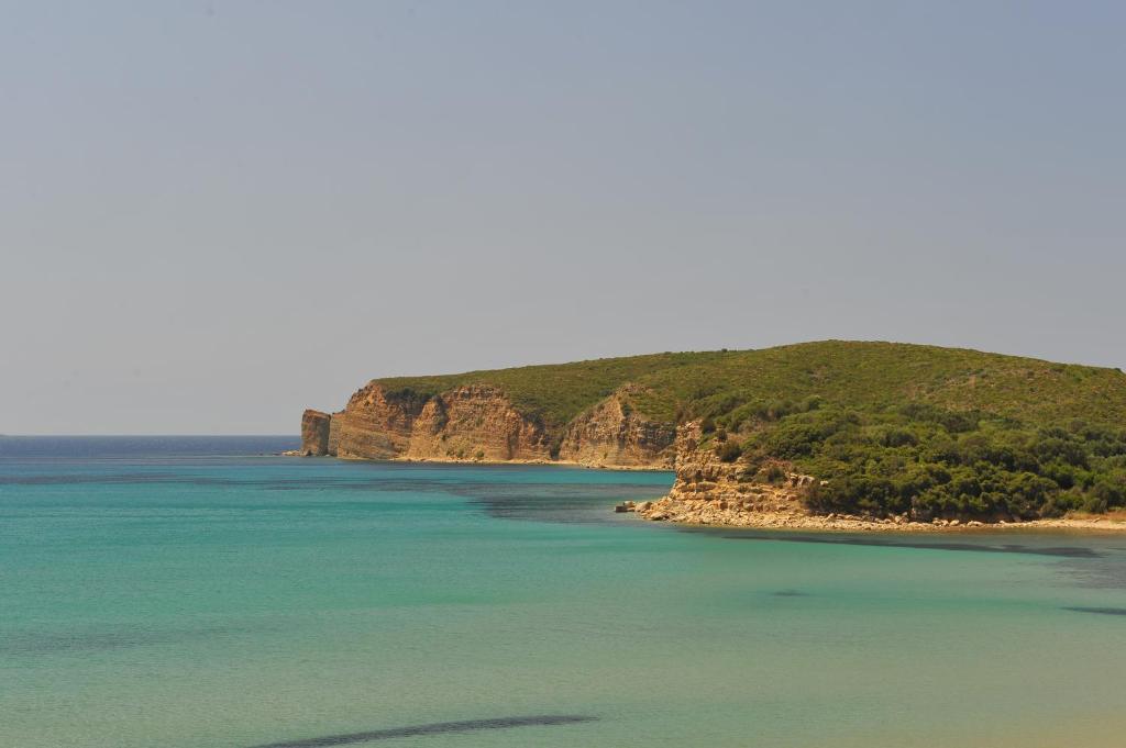an island in the middle of the ocean at Hotel Korakakis Beach in Finikounta