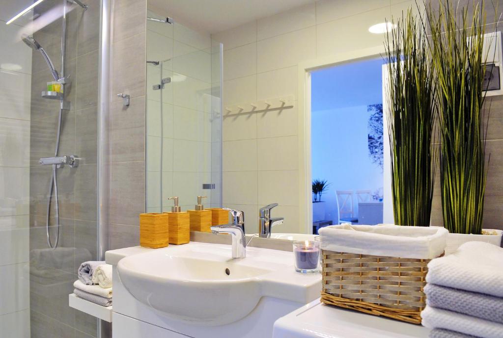 Kúpeľňa v ubytovaní Apartamenty REZULAK Solna B104 204 303