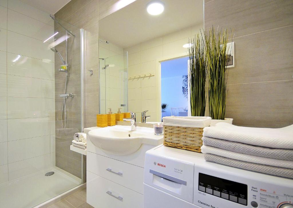 Kúpeľňa v ubytovaní Apartamenty REZULAK Solna B104 204 303