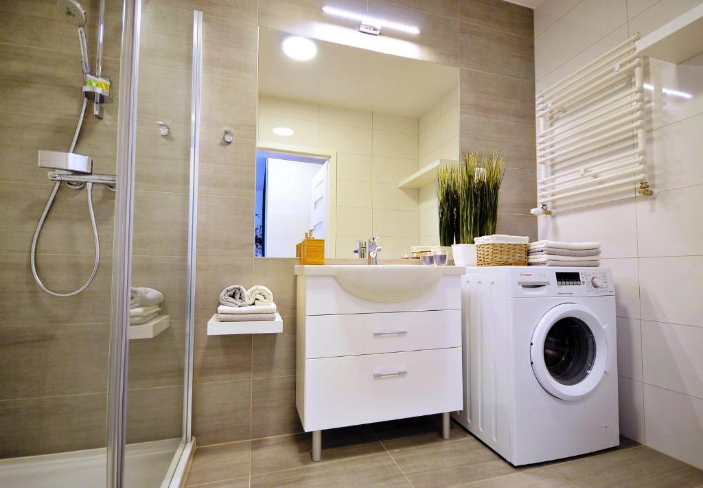 Kúpeľňa v ubytovaní Apartamenty REZULAK Solna B104 204 303