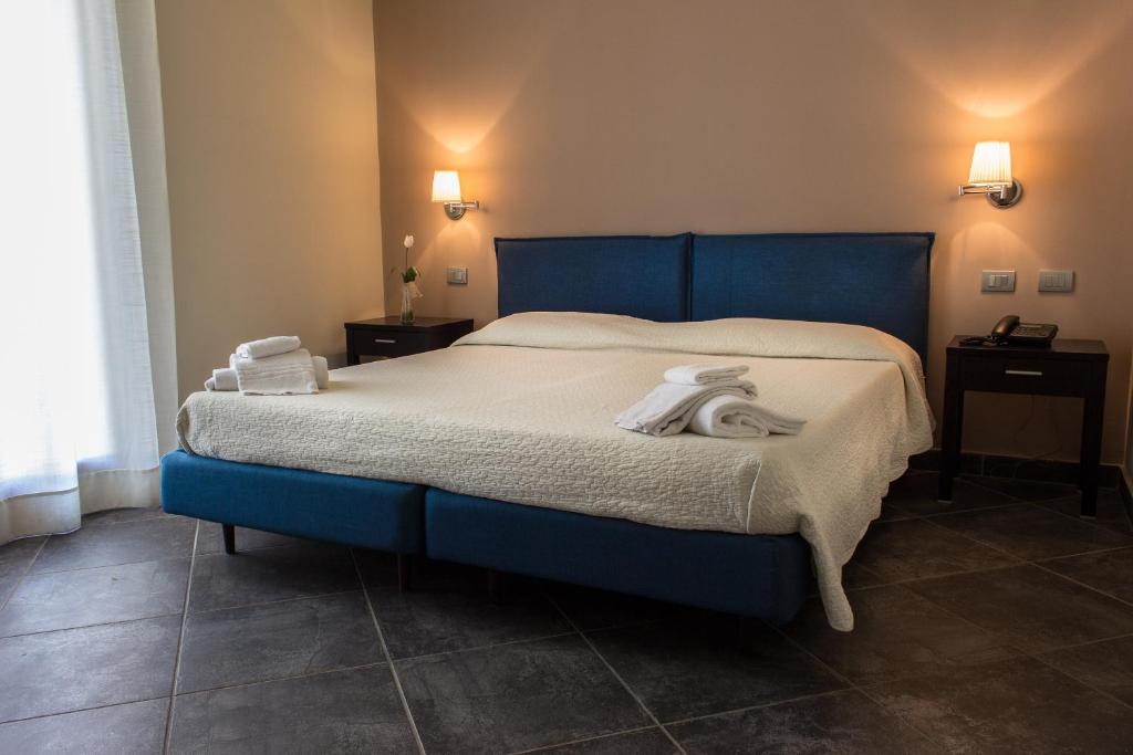 Postel nebo postele na pokoji v ubytování Hotel La Cavalera