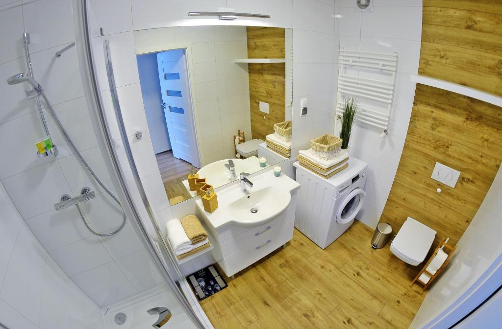 Kúpeľňa v ubytovaní Apartamenty REZULAK Solna B104 204 303