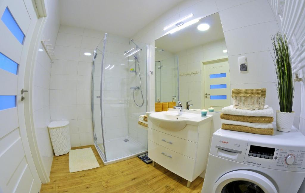 Kúpeľňa v ubytovaní Apartamenty REZULAK Solna B104 204 303