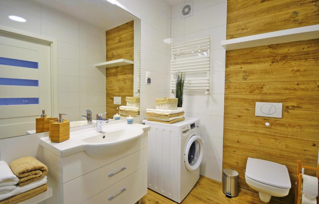 Kúpeľňa v ubytovaní Apartamenty REZULAK Solna B104 204 303