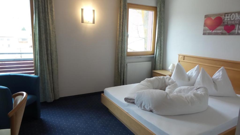 Postel nebo postele na pokoji v ubytování Bad Kochenmoos