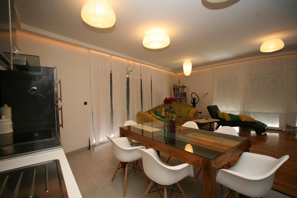 Kuchyň nebo kuchyňský kout v ubytování Domus Apartments