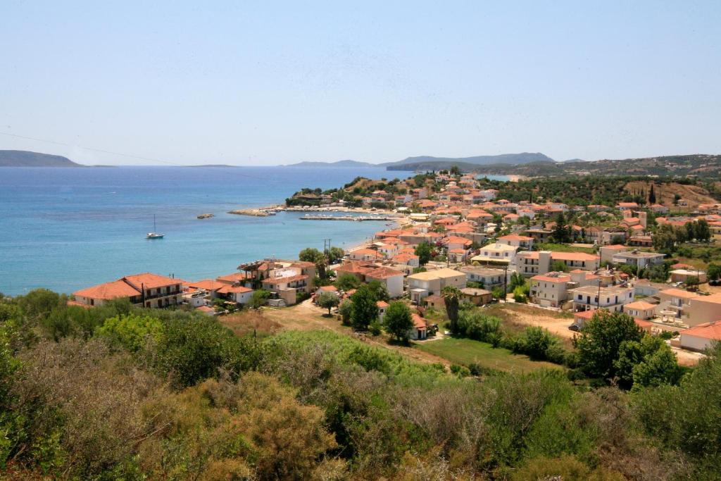 a town on the shore of a body of water at Hotel Korakakis Beach in Finikounta