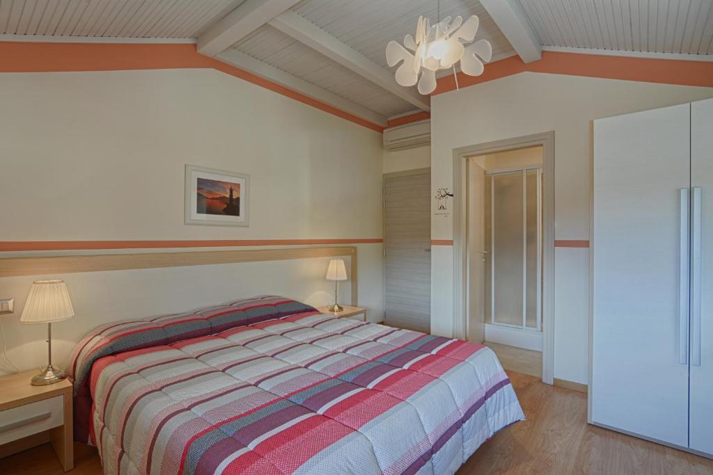 Postel nebo postele na pokoji v ubytování Hotel Europa - Sorico