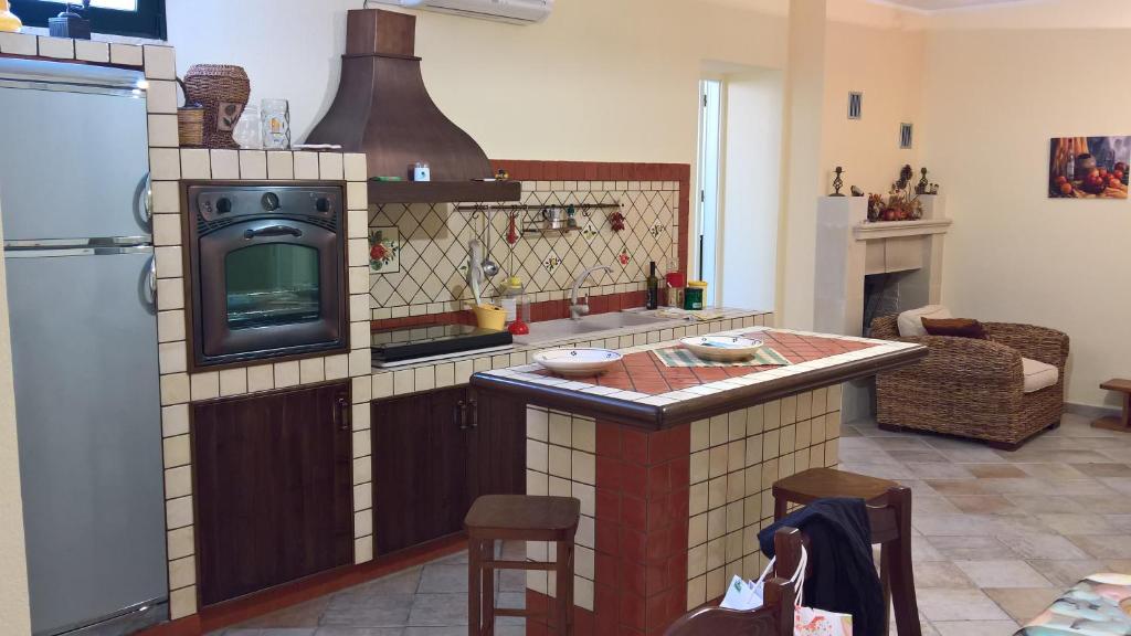 Kuchyň nebo kuchyňský kout v ubytování B&B Verardo