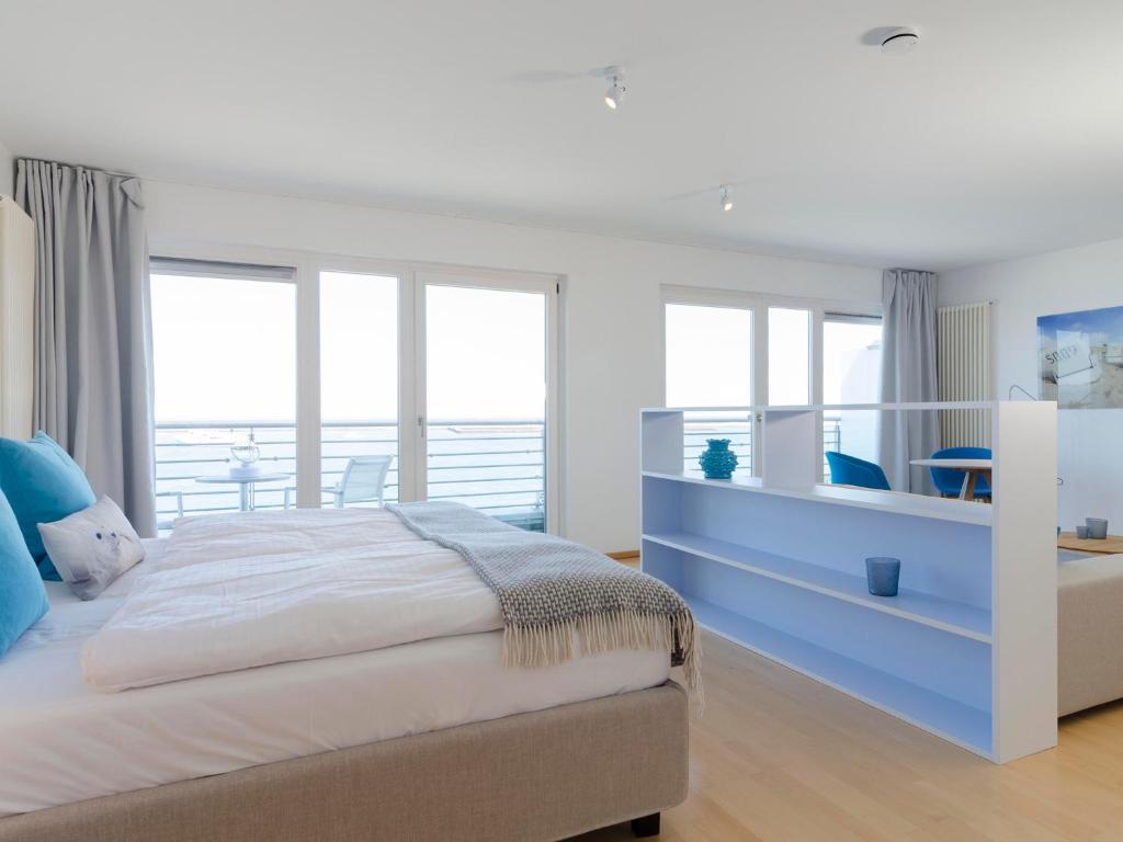 Postel nebo postele na pokoji v ubytování atoll apartments