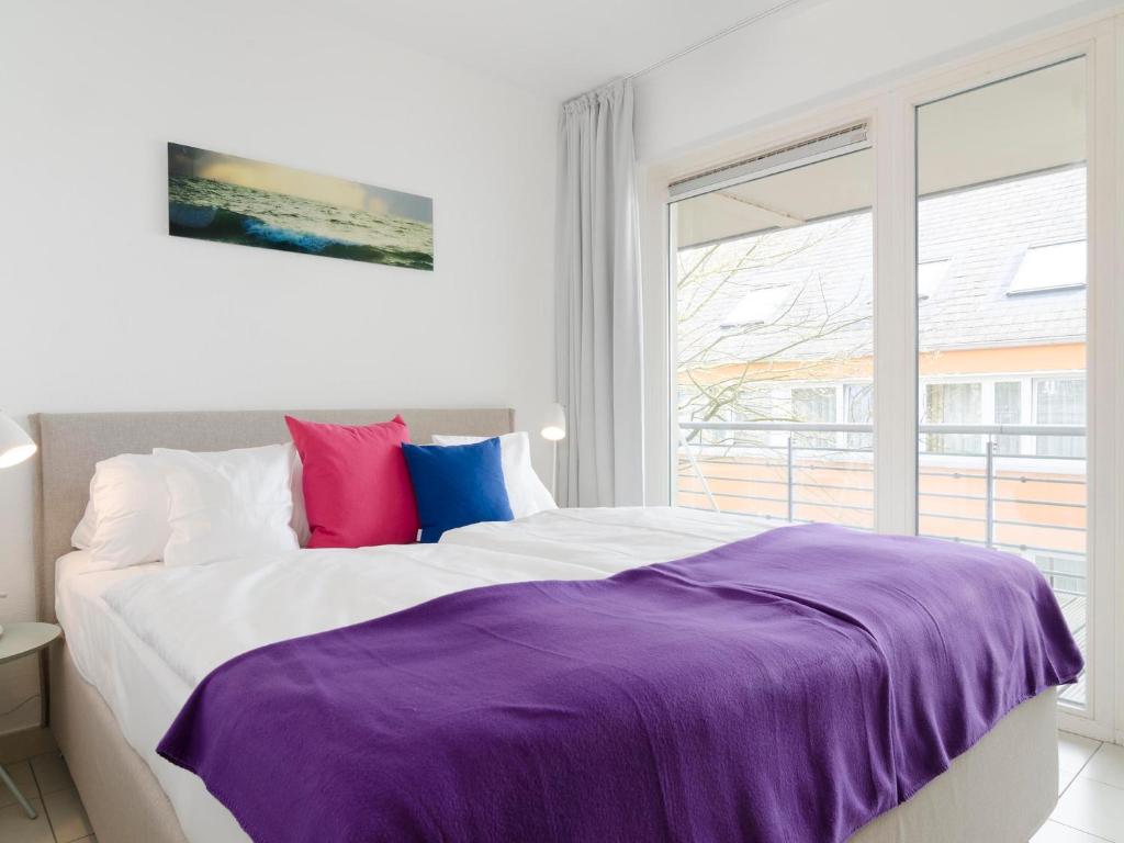 Postel nebo postele na pokoji v ubytování atoll apartments