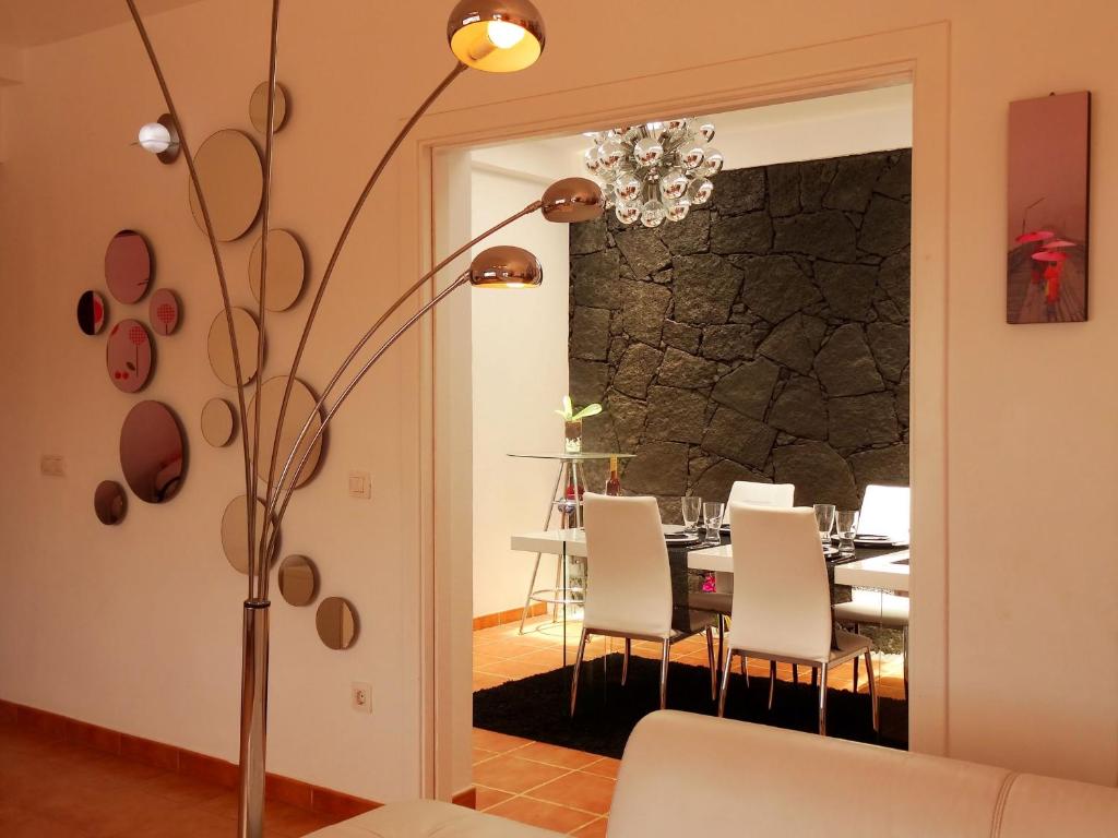 Posezení v ubytování Happy Villa con piscina privada
