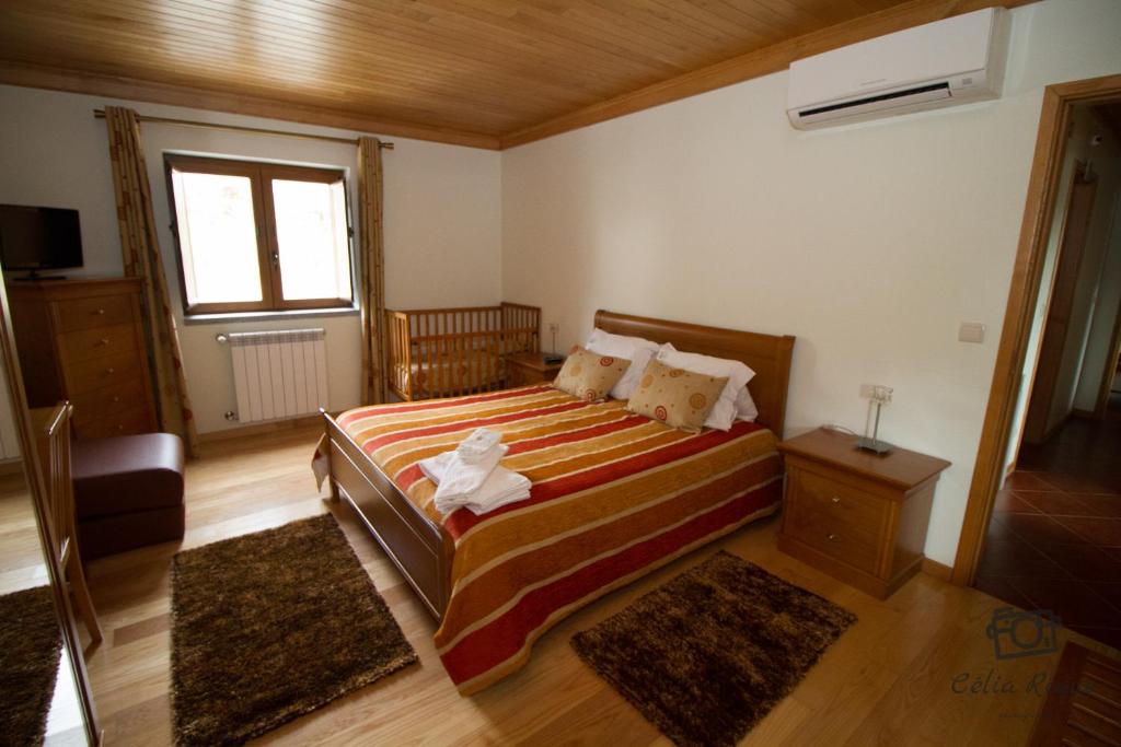 Postel nebo postele na pokoji v ubytování Casa da Ribeirinha