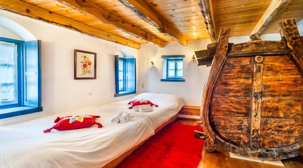 Postel nebo postele na pokoji v ubytování Guesthouse Ioannidis