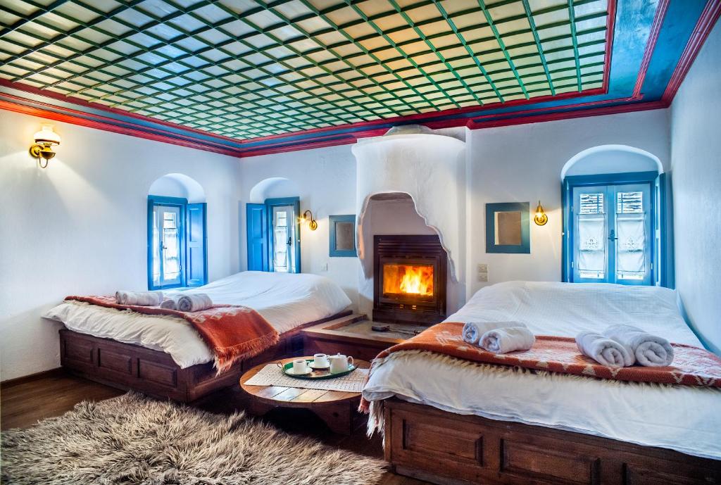 Postel nebo postele na pokoji v ubytování Guesthouse Ioannidis