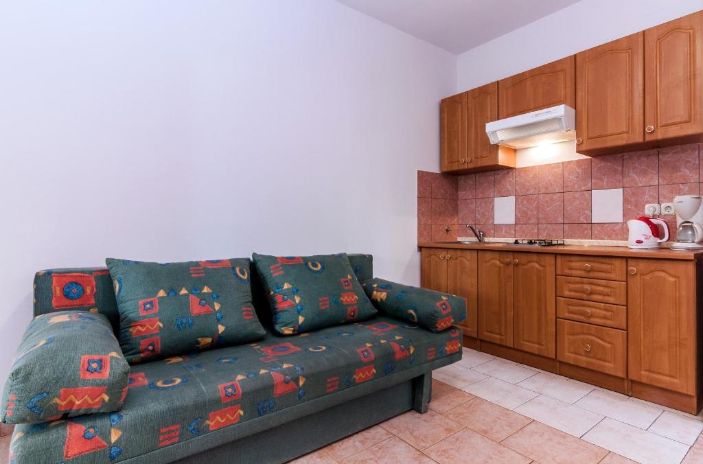 Kuchyň nebo kuchyňský kout v ubytování Villa Mare Apartments