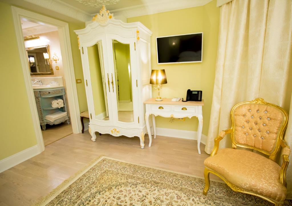 TV a/nebo společenská místnost v ubytování Palazzo Venezia-Adults Only