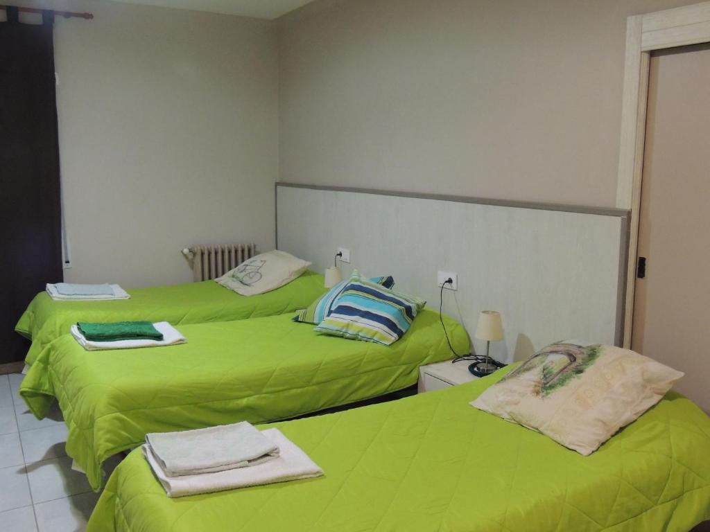 Postel nebo postele na pokoji v ubytování Hostal Can Massot