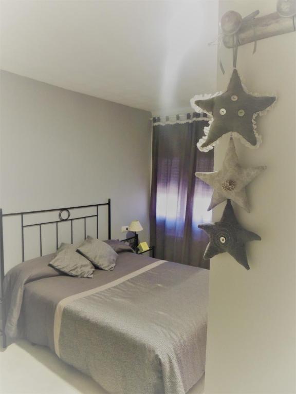 Postel nebo postele na pokoji v ubytování Hostal Can Massot