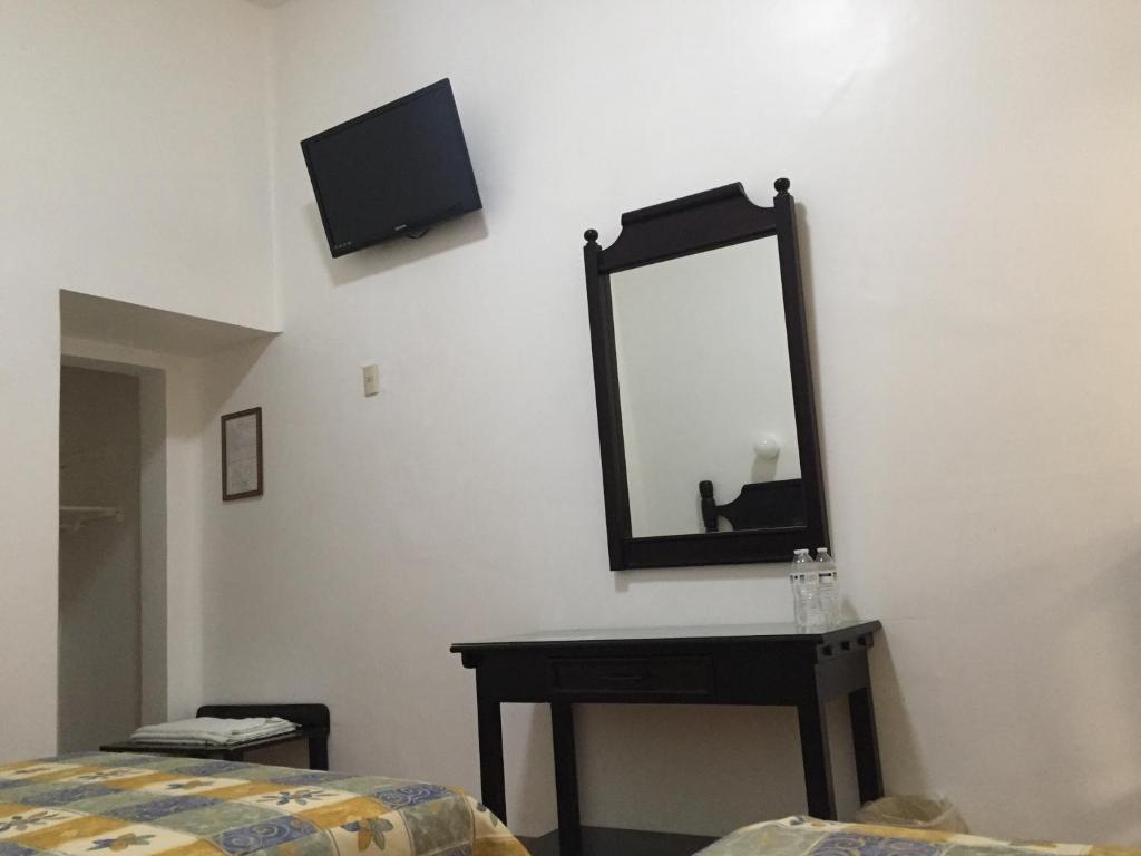 Postel nebo postele na pokoji v ubytování Hotel de los baños