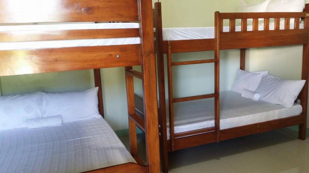 Postel nebo postele na pokoji v ubytování Chamie's Transient House