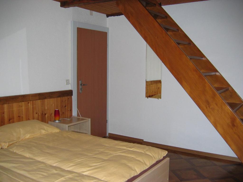 Postel nebo postele na pokoji v ubytování Auberge du Prévoux