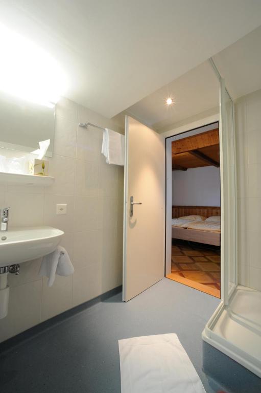 Postel nebo postele na pokoji v ubytování Auberge du Prévoux