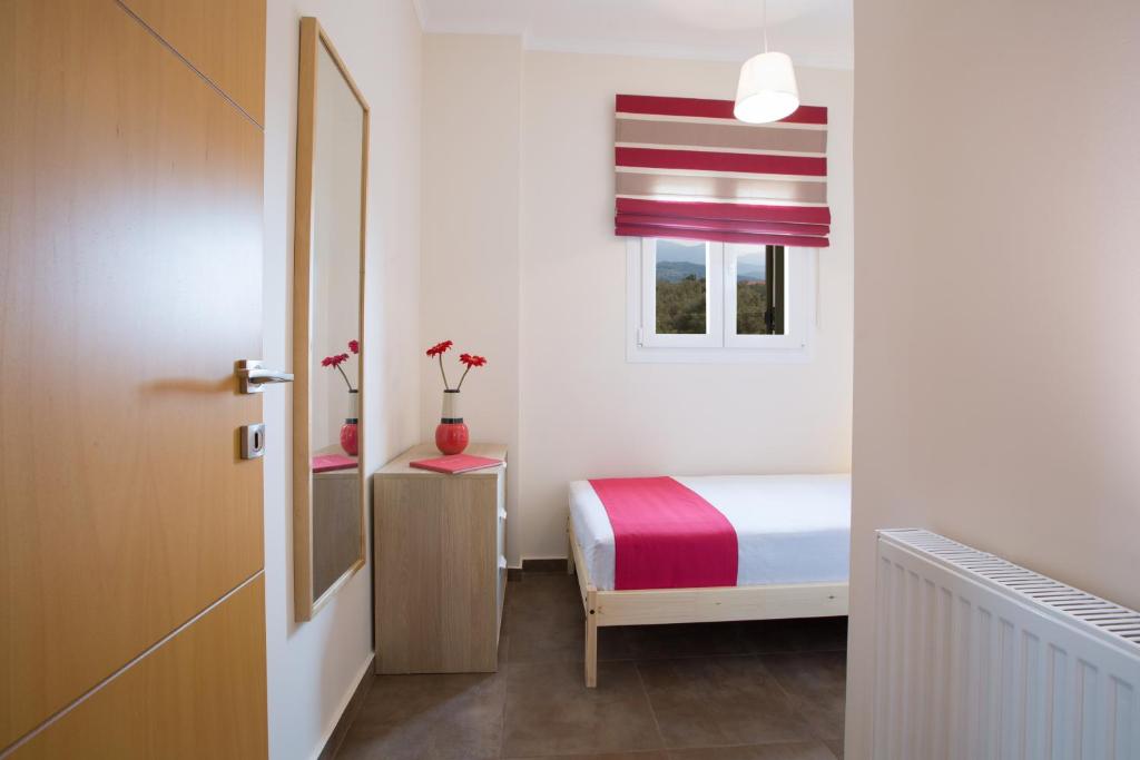 Postel nebo postele na pokoji v ubytování Alegria Boutique Villas