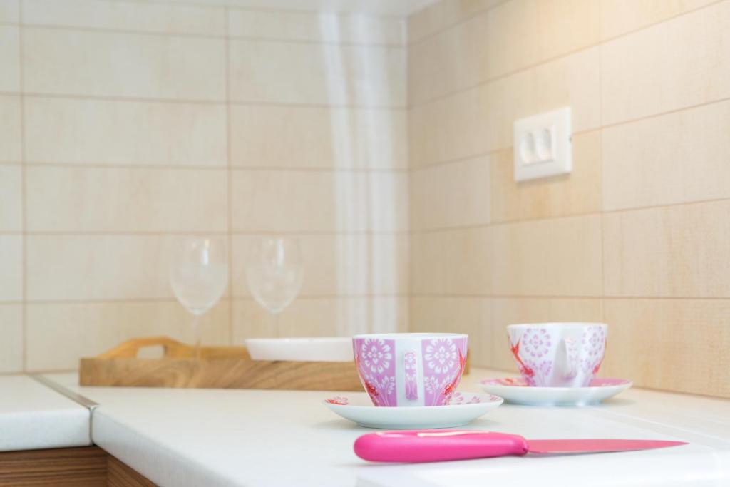 Postel nebo postele na pokoji v ubytování Alegria Boutique Villas
