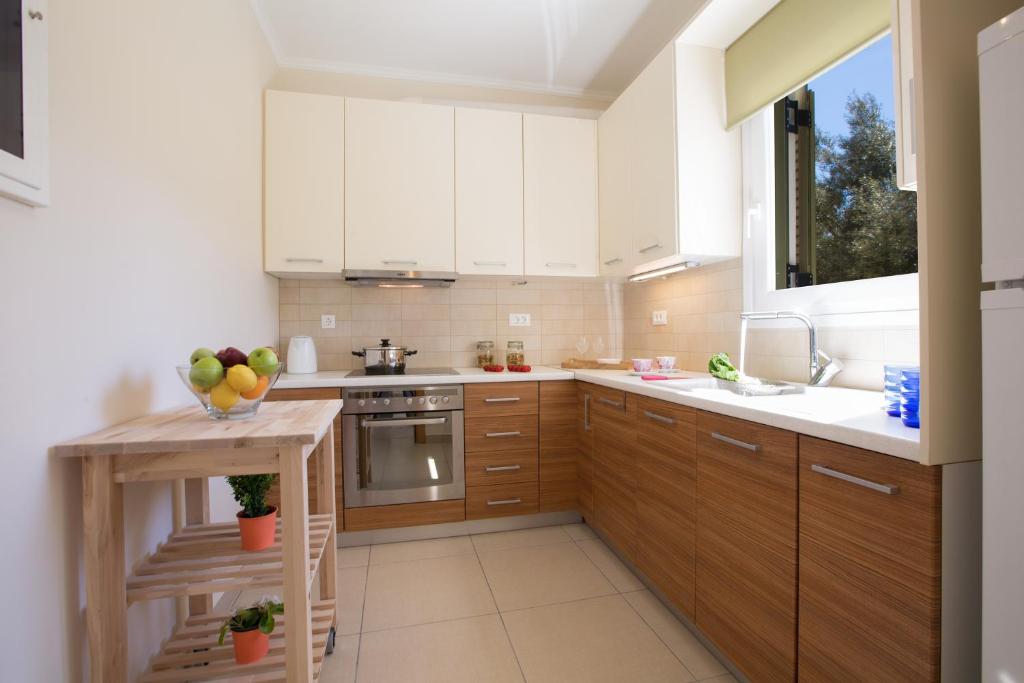 Kuchyň nebo kuchyňský kout v ubytování Alegria Boutique Villas