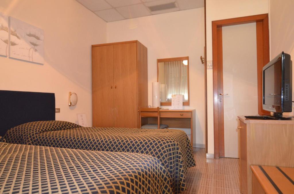 TV a/nebo společenská místnost v ubytování Hotel Magnolia