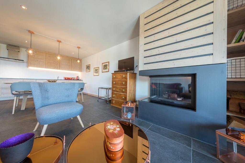 Posezení v ubytování Apartment La Forêt 5 - Spa access - Centre Station