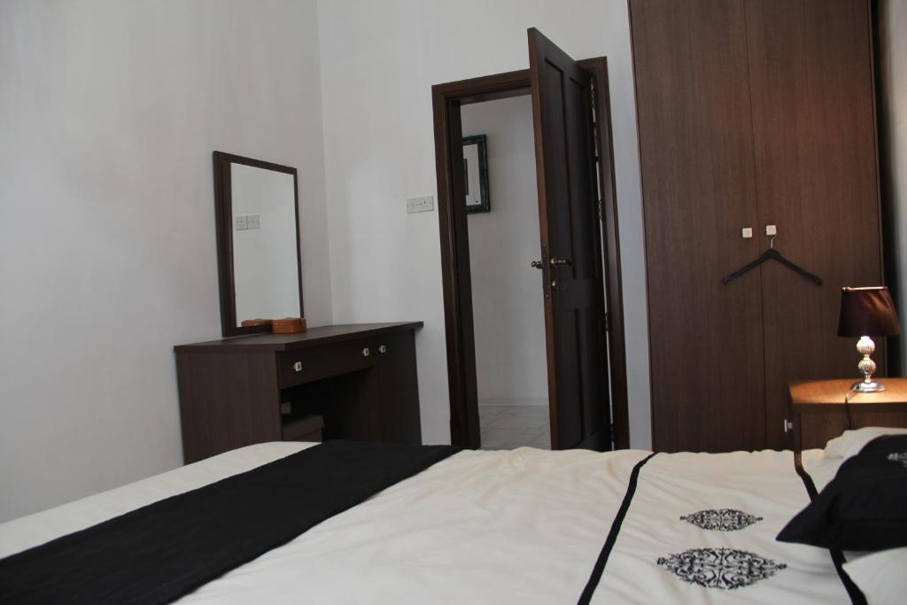 Postel nebo postele na pokoji v ubytování Merhba APT 3