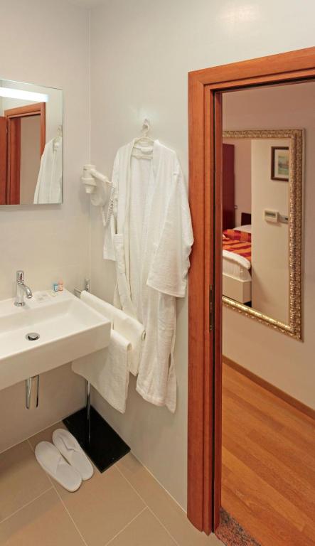 Koupelna v ubytování Hotel Monika