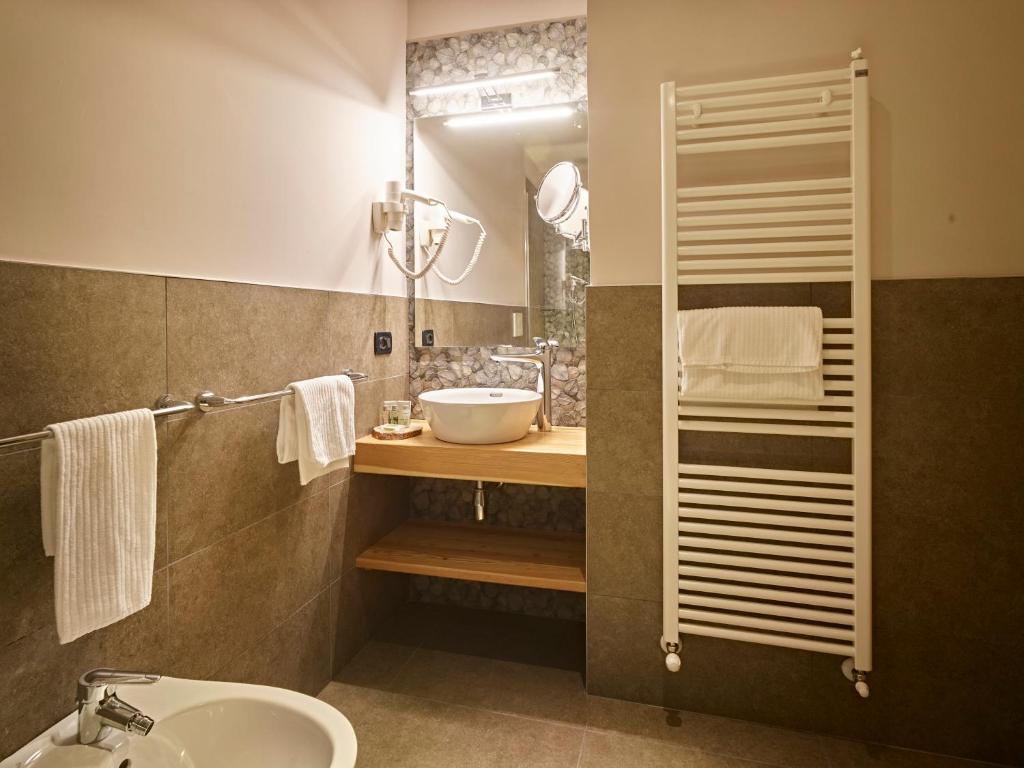 Koupelna v ubytování Hotel Garni My Ledro
