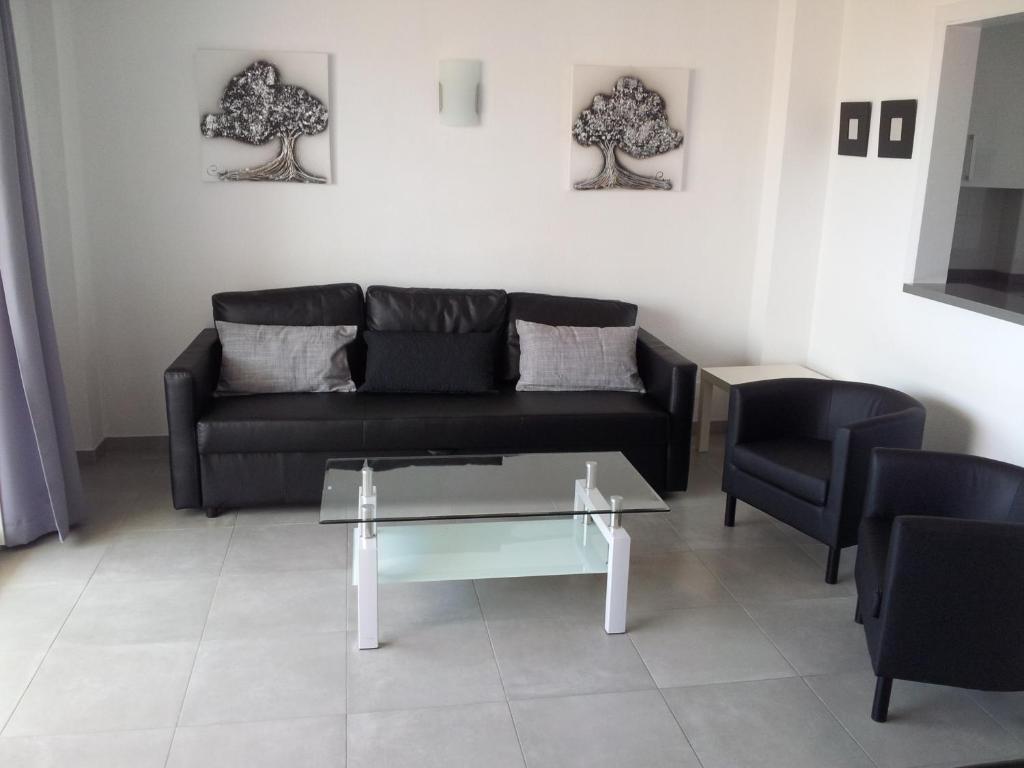 Posedenie v ubytovaní Precioso Apartamento Frente Al Mar